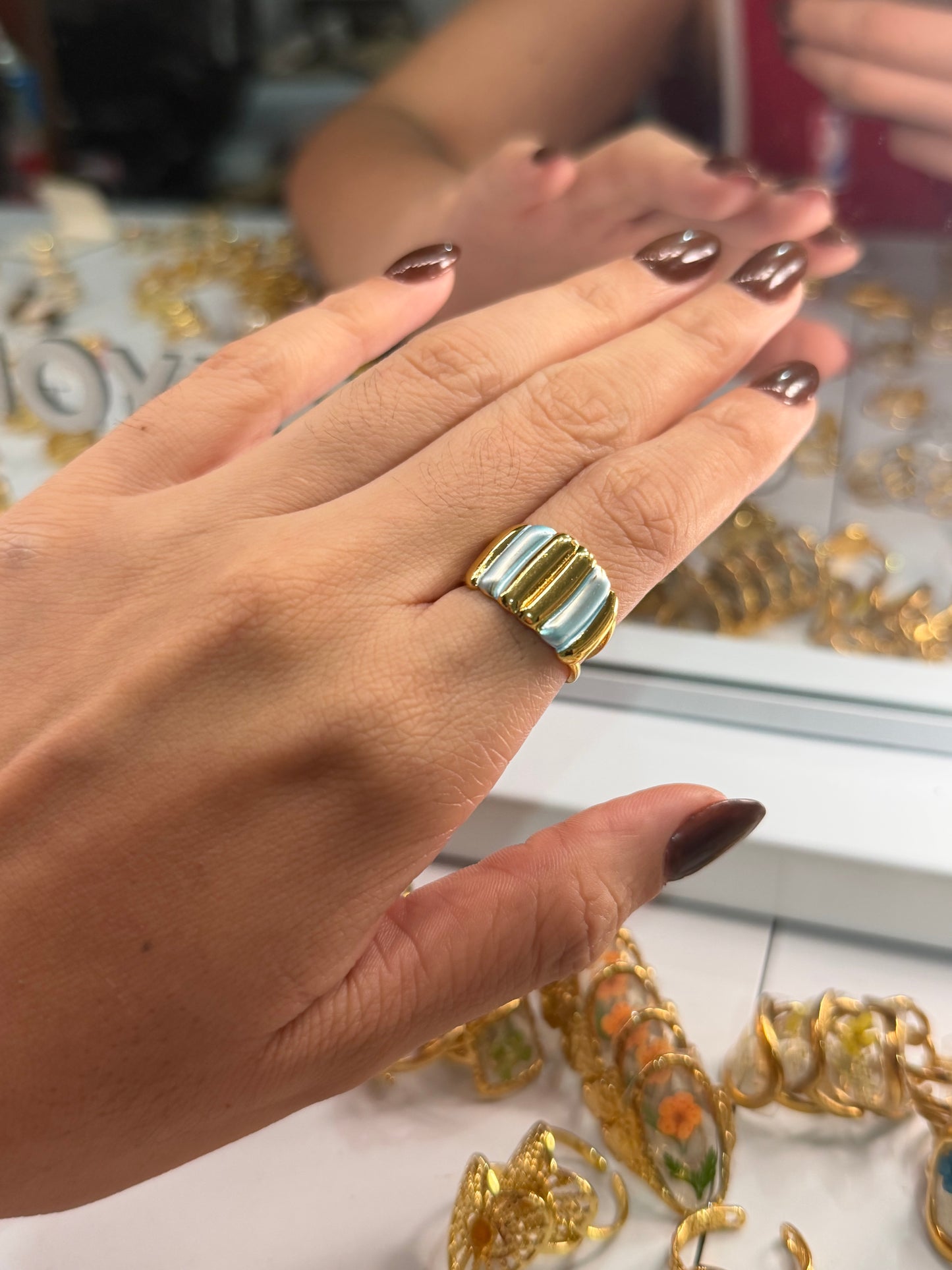 Anillo ovalos azul dorado