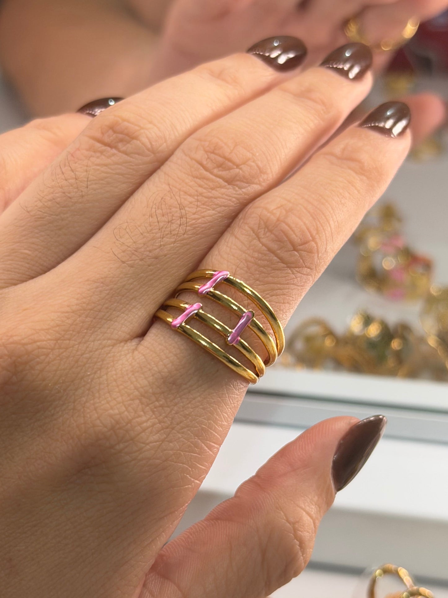 Anillo cuadruple dorado rosa