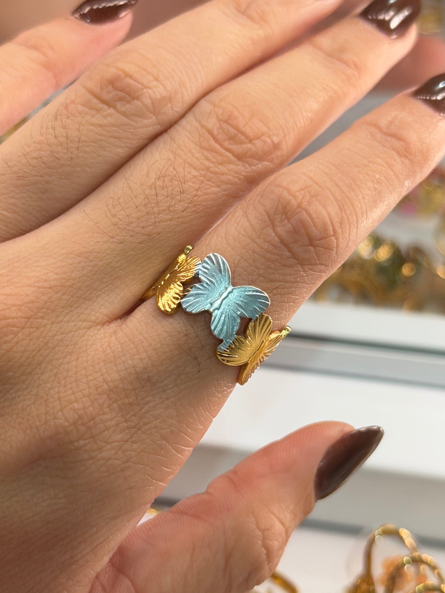 Anillo mariposa azul dorado