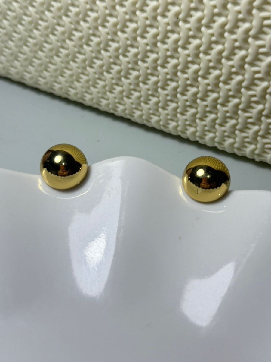 Aretes bola dorada