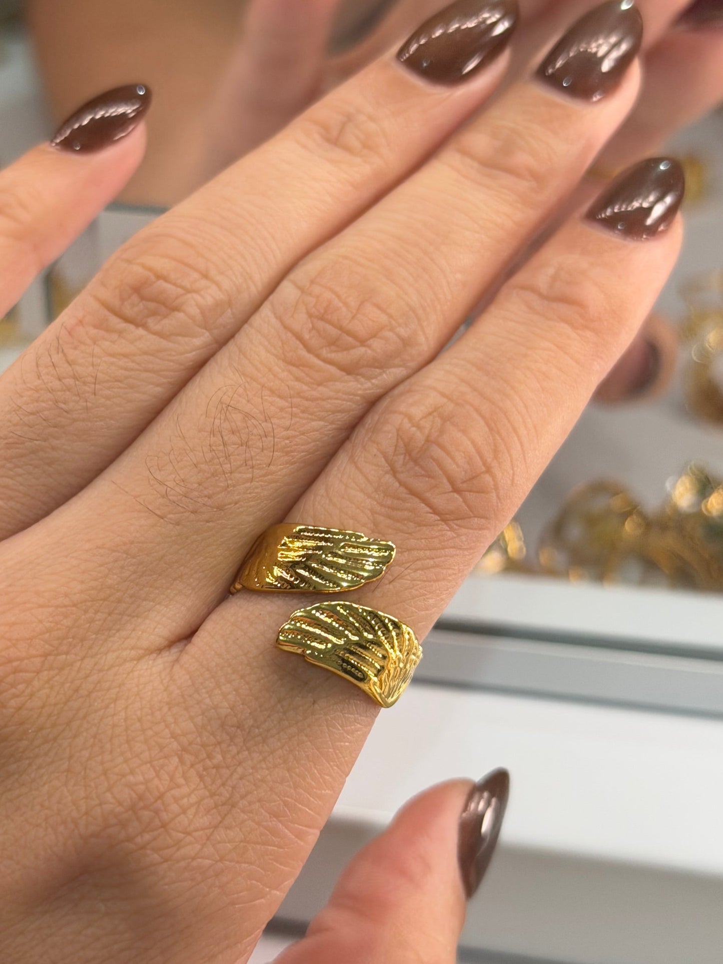 Anillo alas doradas