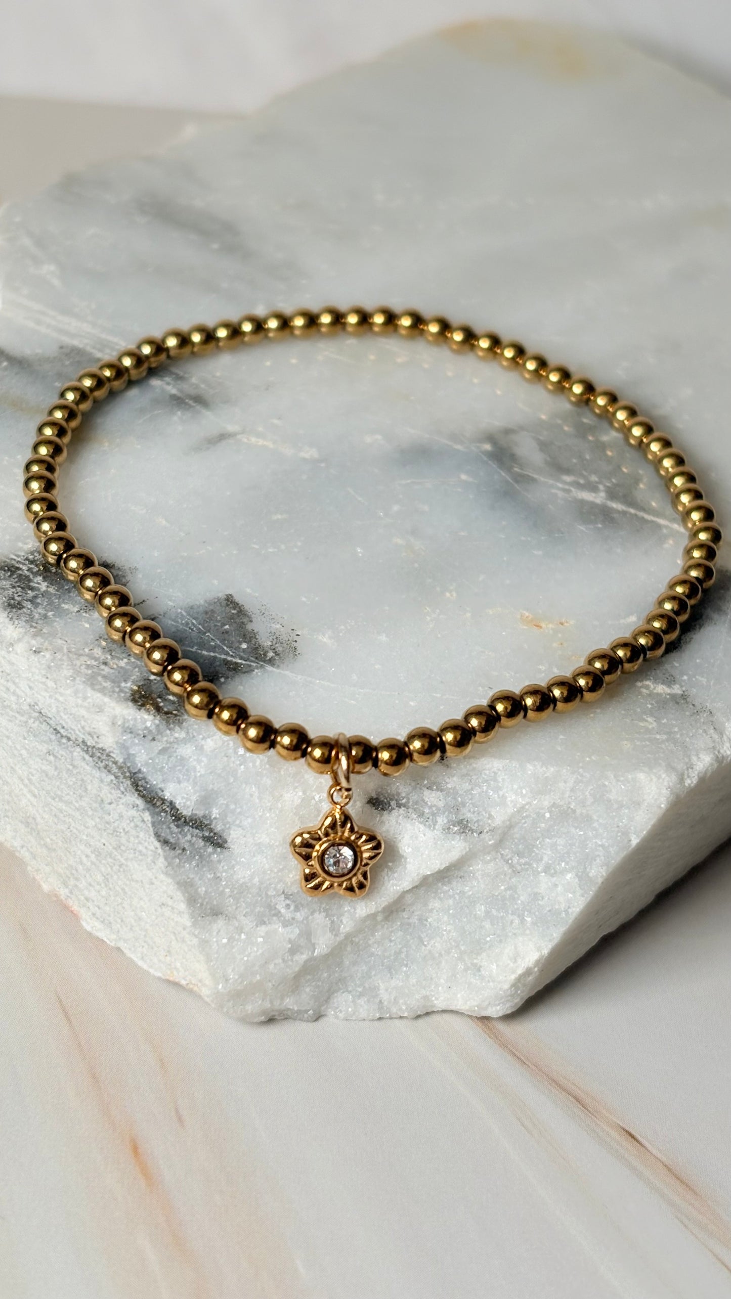 pulsera balines dije estrella dorado