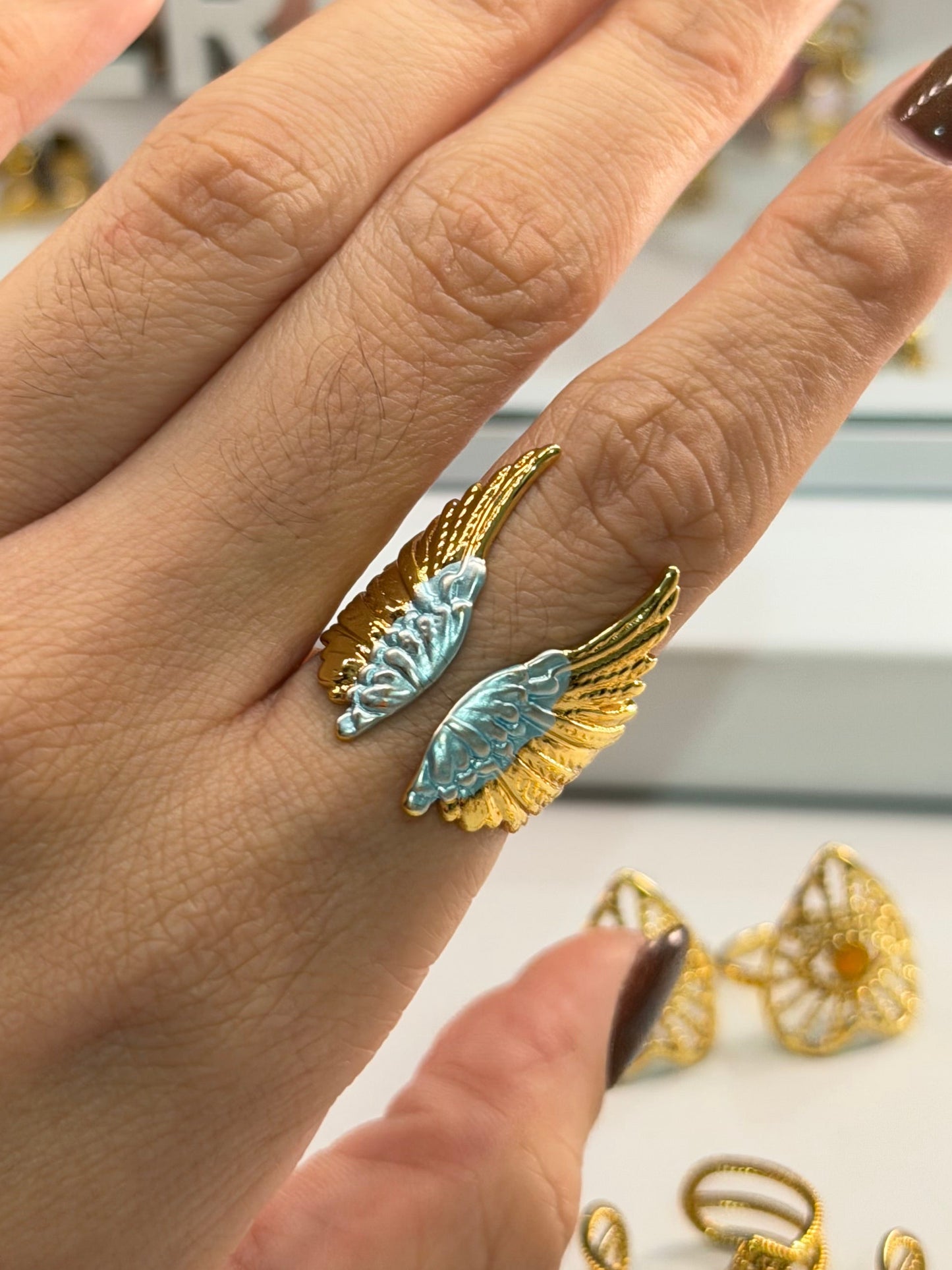 anillo alas dorado azul