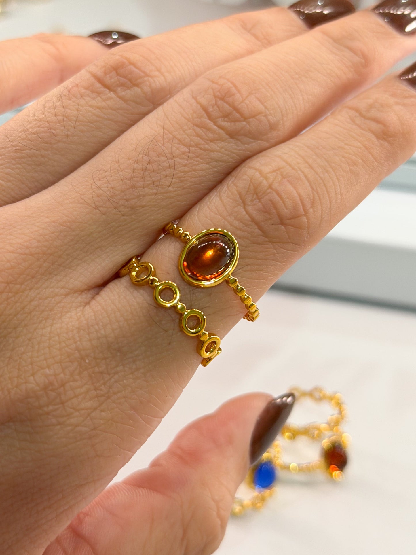 anillo doble dorado piedra marmoleada