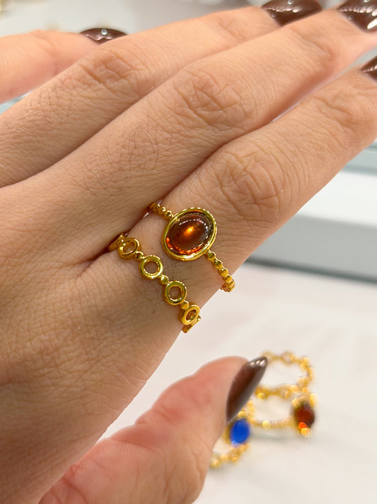 anillo doble dorado piedra marmoleada
