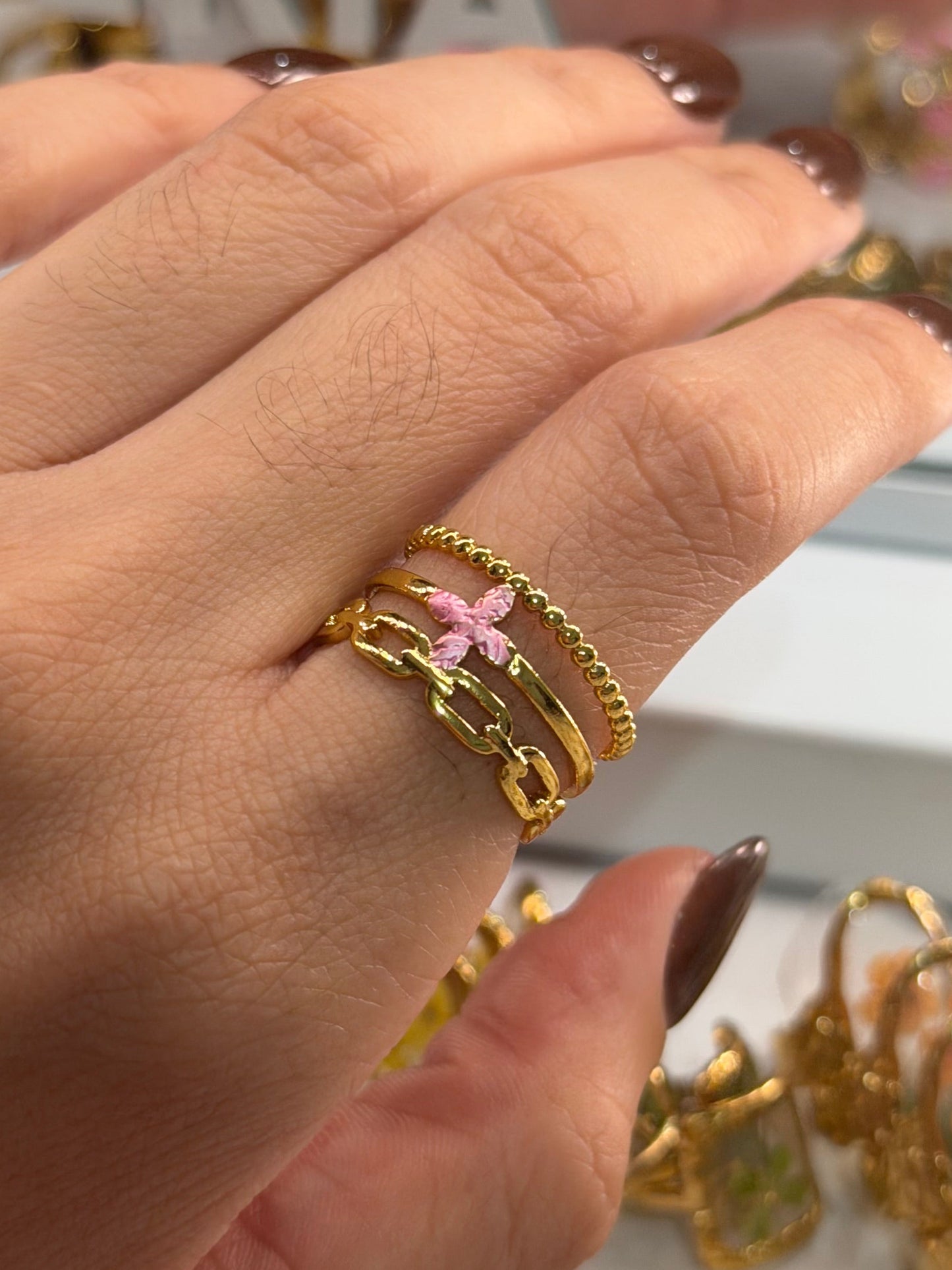 Anillo triple cadena flor rosada