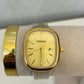 Reloj cuadrado casio bicolor (fondo dorado)