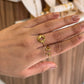 Anillo remolino dorado