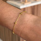 pulsera balines mini dorada