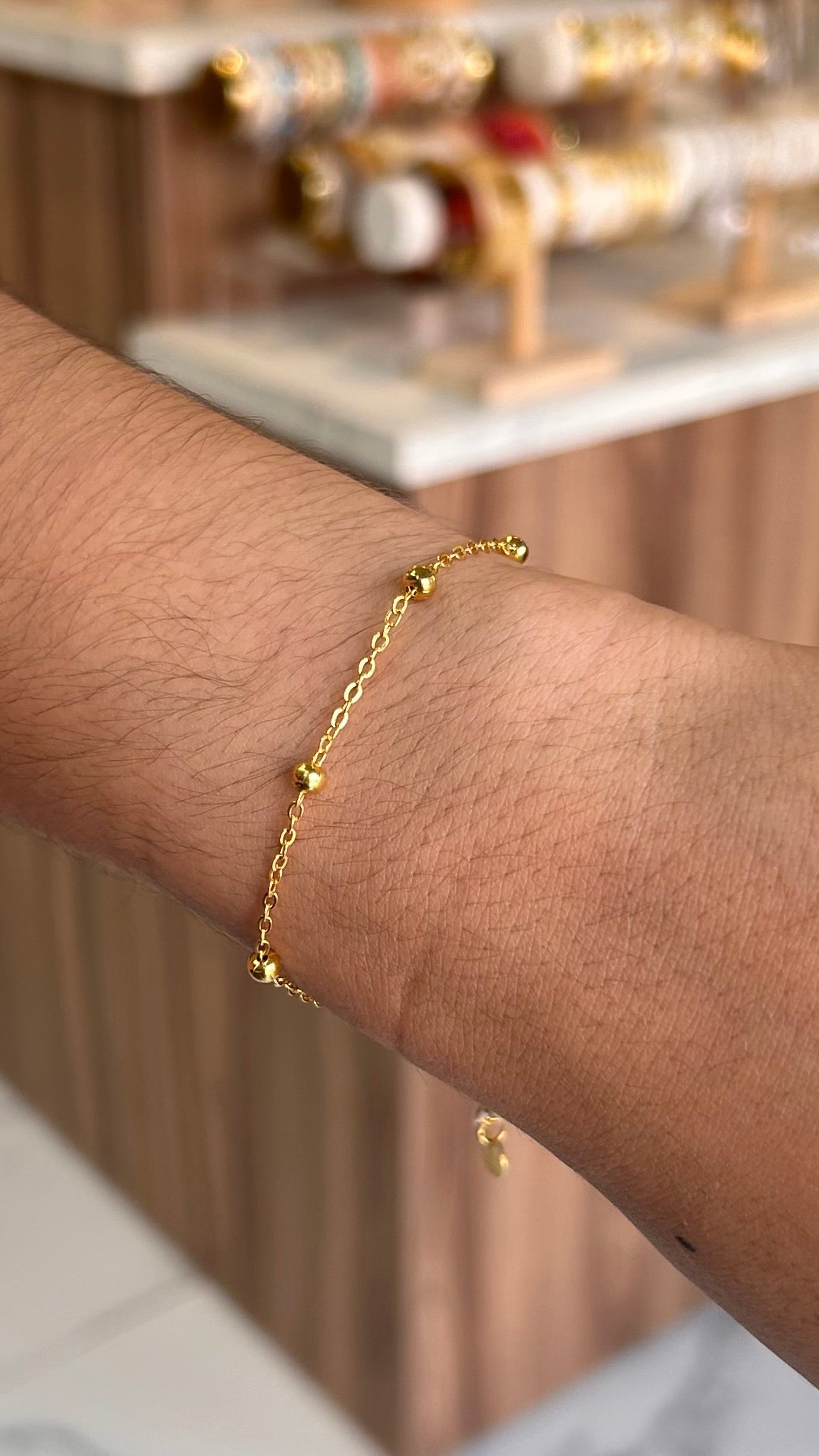 pulsera balines mini dorada
