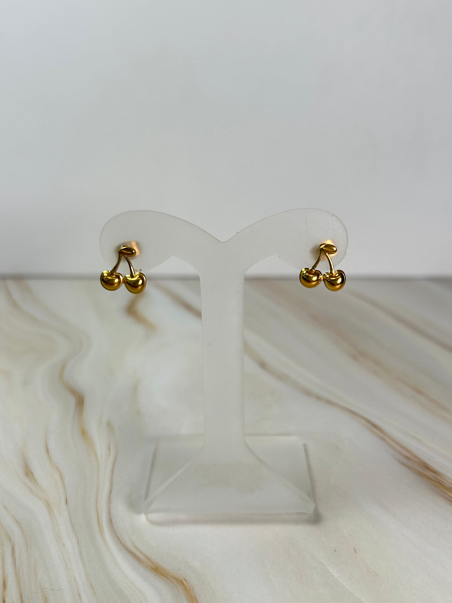 Aretes cereza dorado