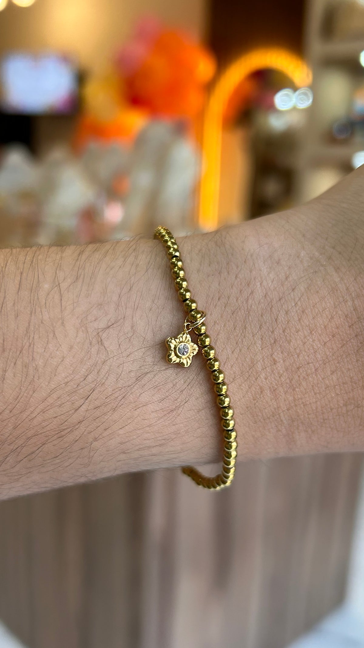 pulsera balines dije estrella dorado