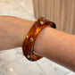 pulsera acrílica puntos dorado