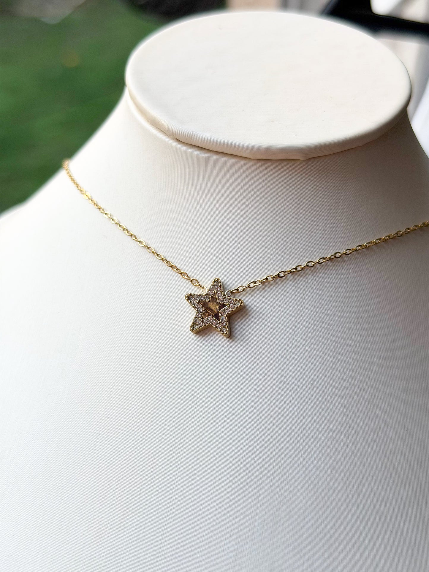Collar estrella dorado cafe