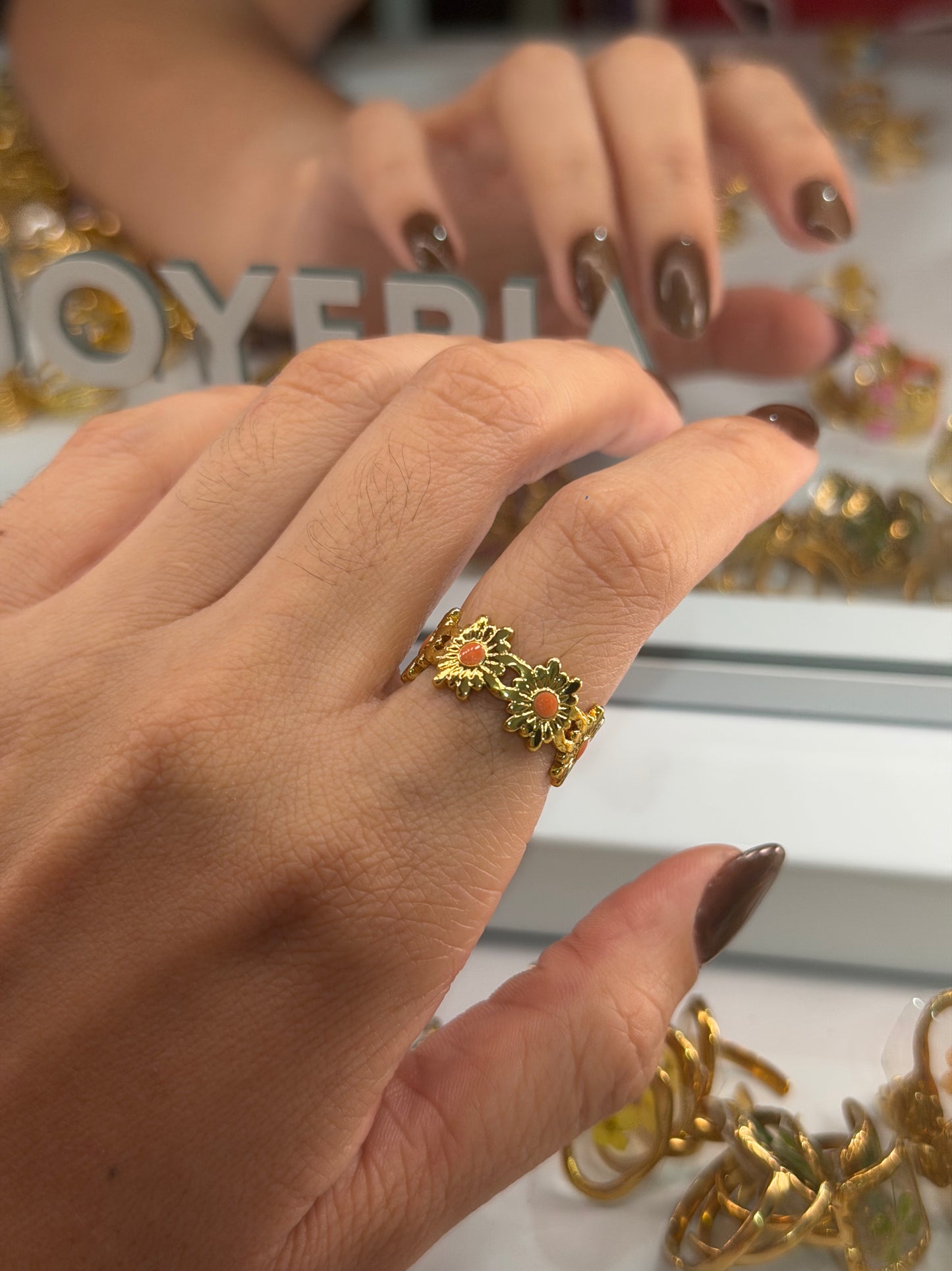 Anillo flores doradas naranja