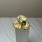 Anillo flor piedras