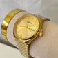 Reloj casio dorado (fondo dorado)