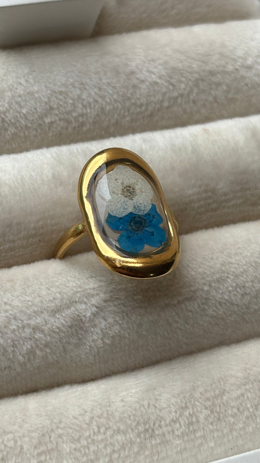 Anillo flor natural azul blanco