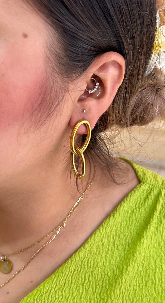Aretes ovalado doble dorado