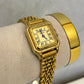 Reloj Cárter dorado (fondo dorado)