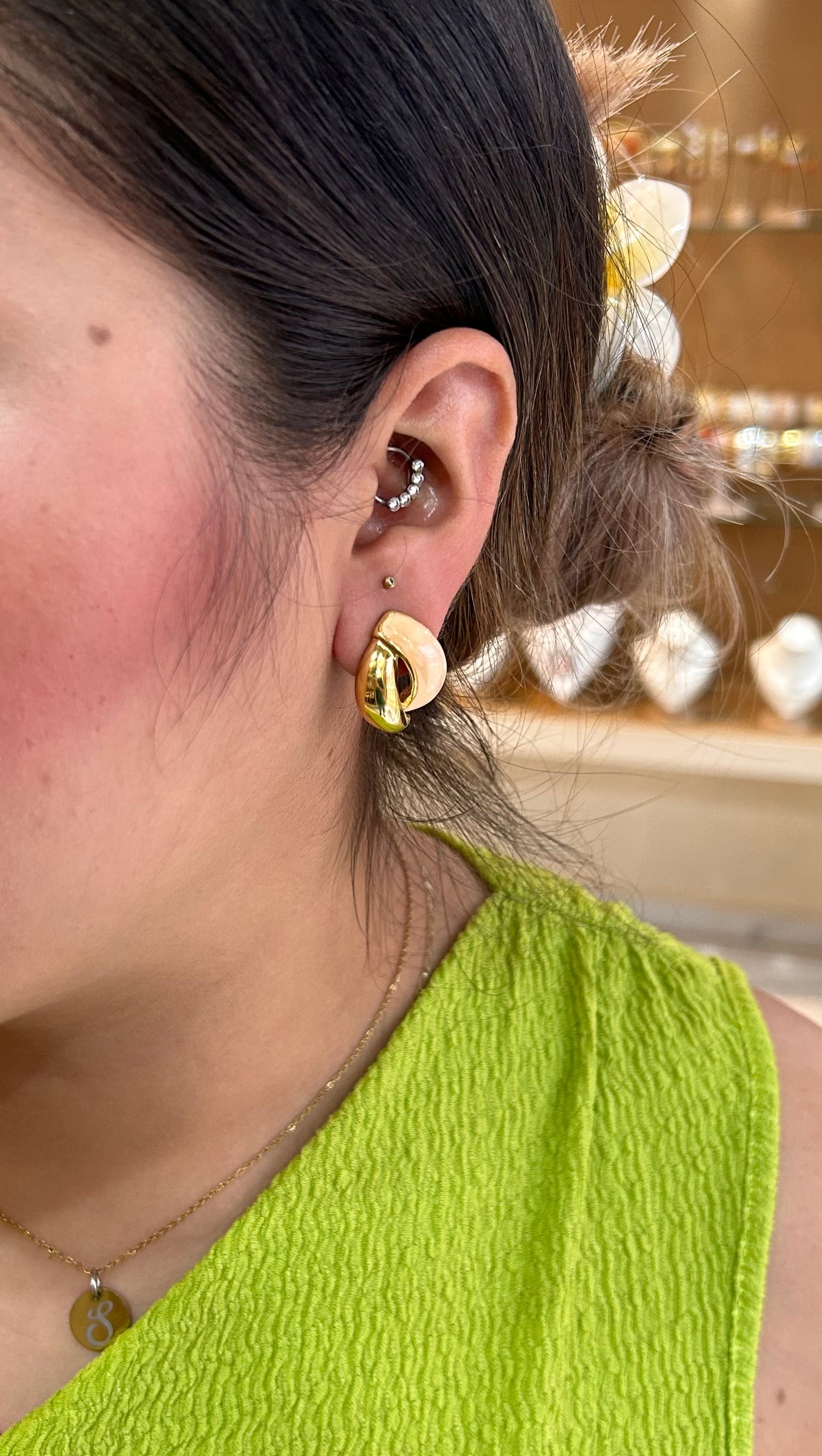 Arete rosa dorado