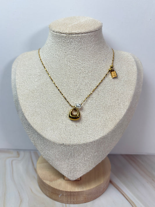 Collar bolsita perla dorada