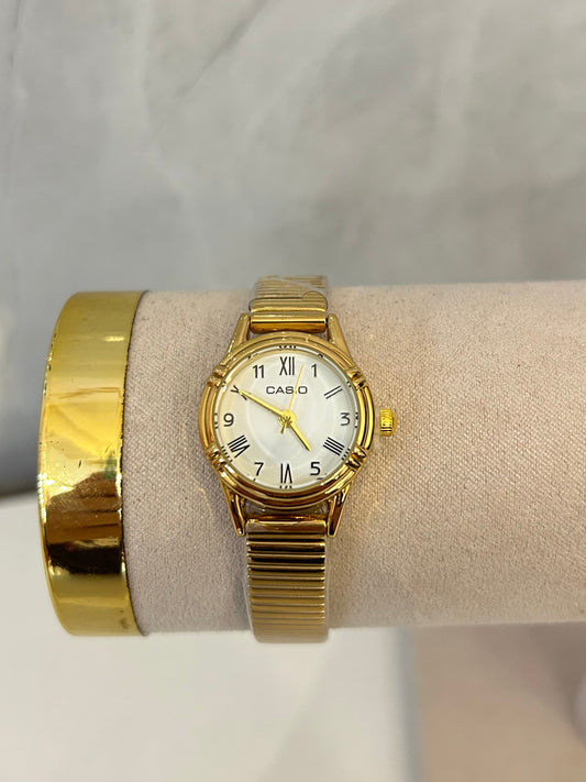 Reloj circular mini dorado