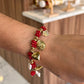 pulsera charm de rojo dorado
