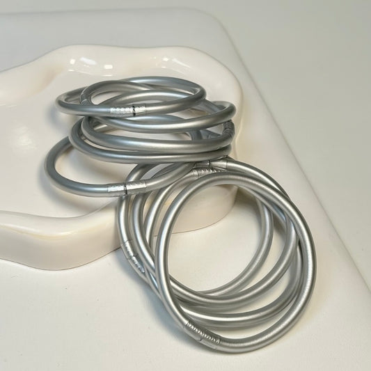 Pulseras hule plata