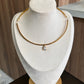 Collar regido dorado piedra gota