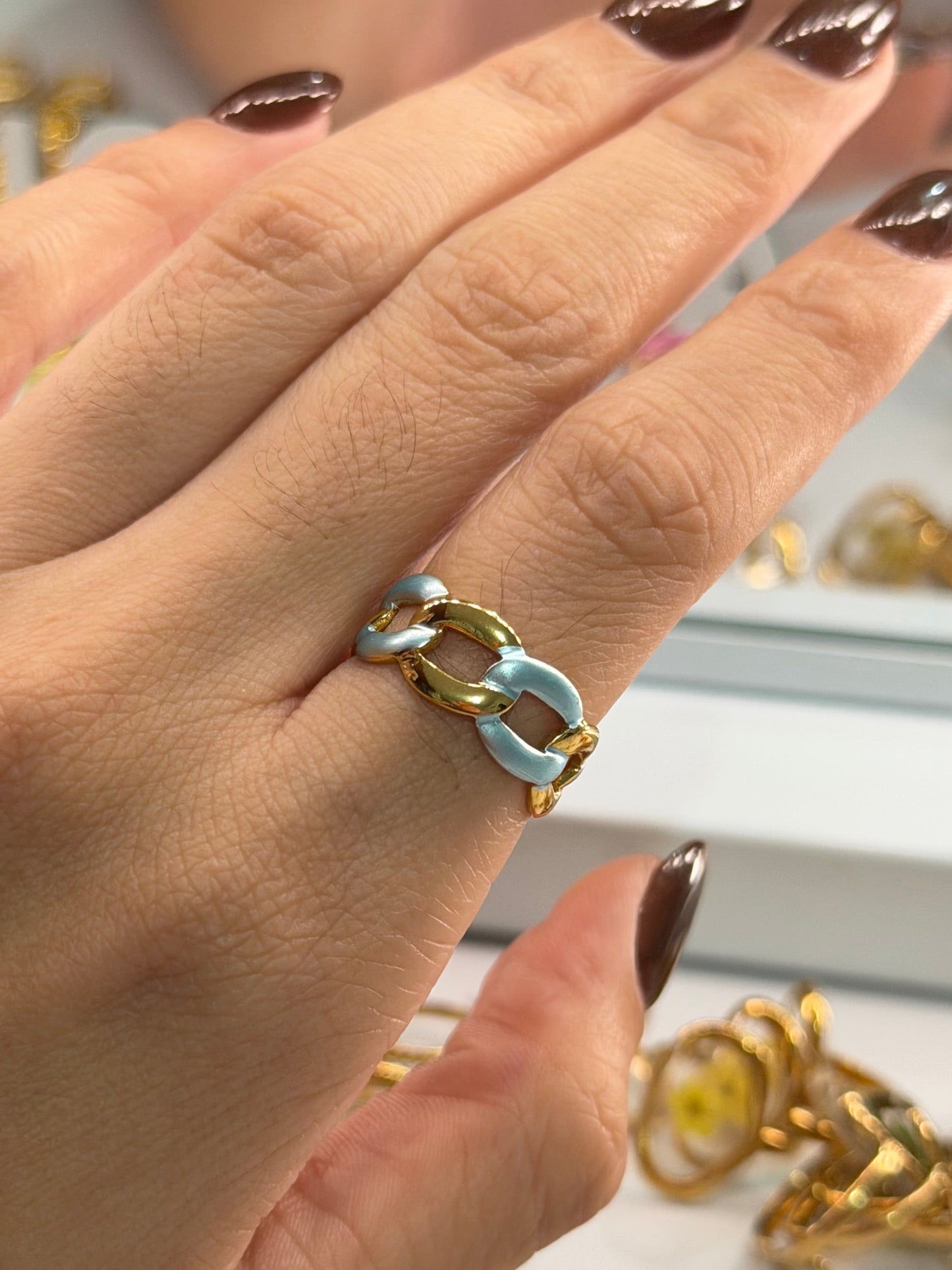 Anillo cadena azul dorado