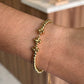 pulsera balines trebol dorado