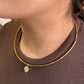 Collar regido dorado piedra circular