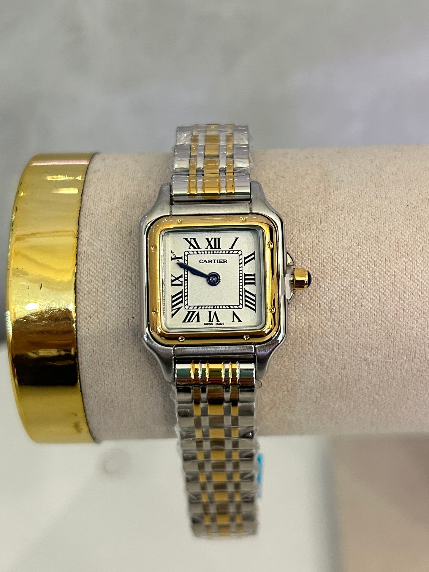 Reloj Cárter bicolor