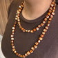 Collar corbatero de piedras hermosas color tonos naranja
