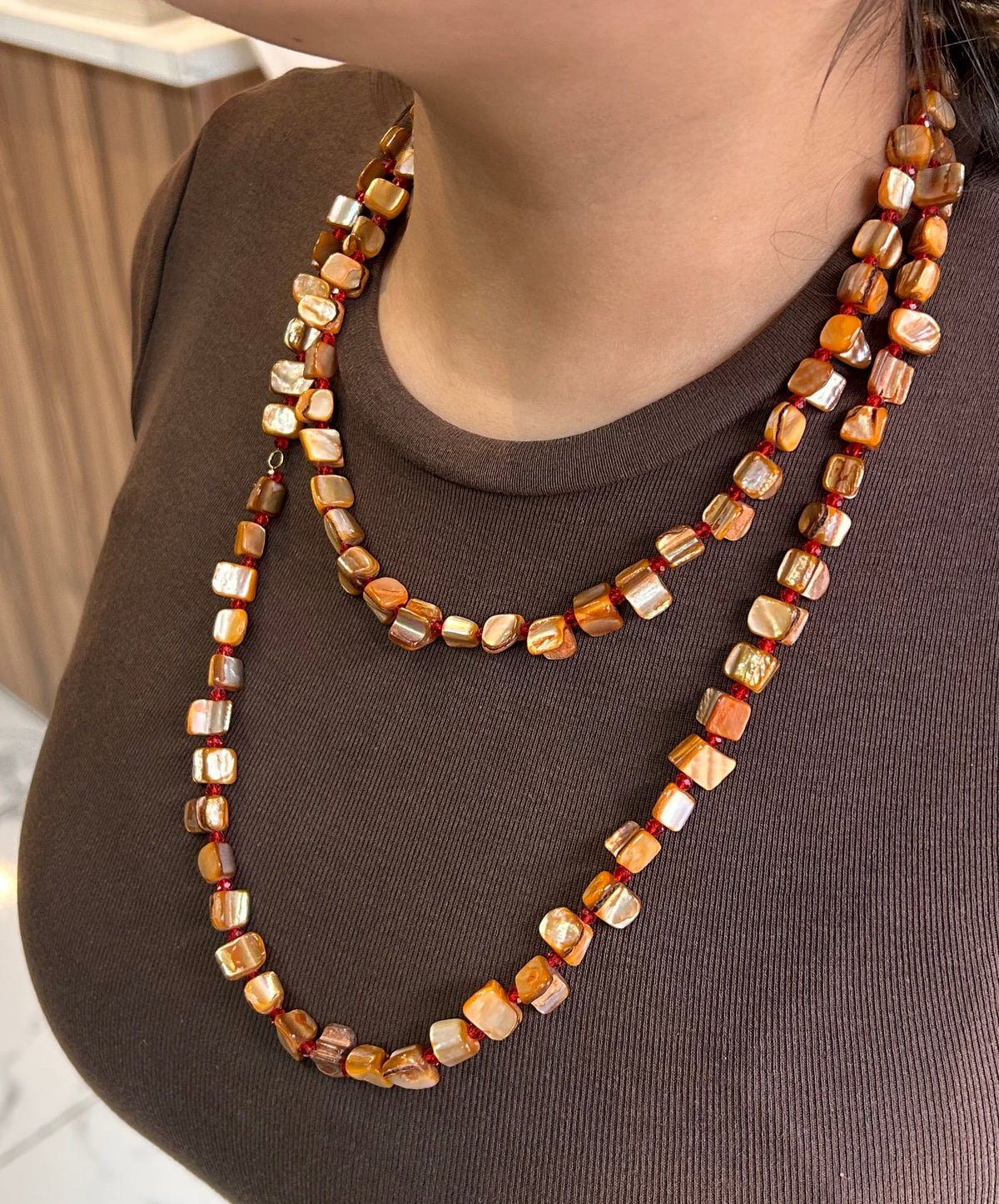 Collar corbatero de piedras hermosas color tonos naranja