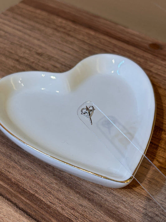 piercing espada de corazón