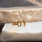 Anillo geométrico dorado