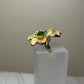 Anillo flor piedras