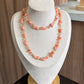 Collar corbatero de piedras hermosas color tonos rosados