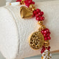 pulsera charm de rojo dorado