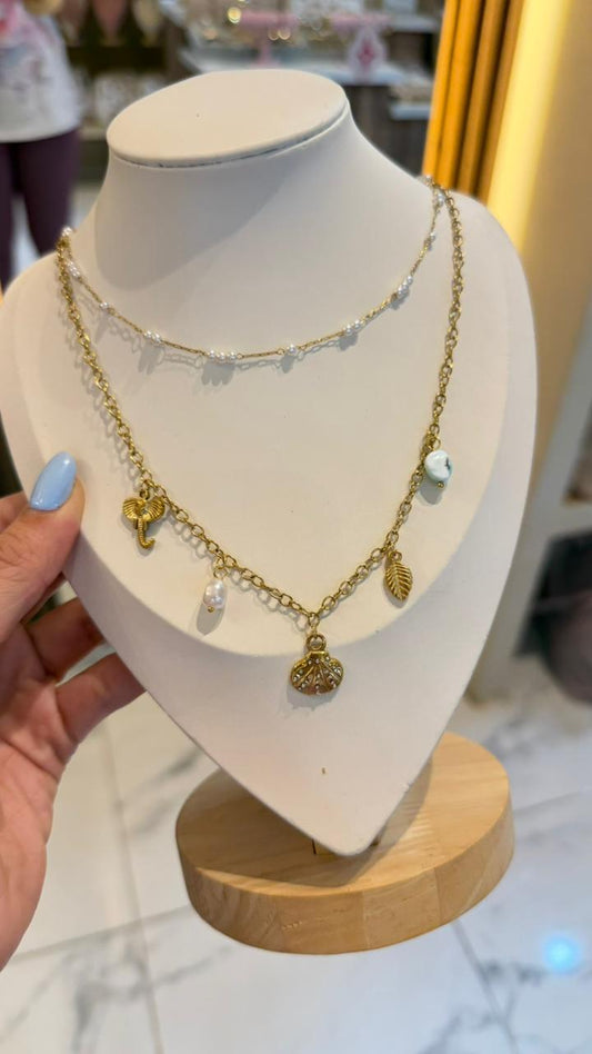 Collar doble concha dorado